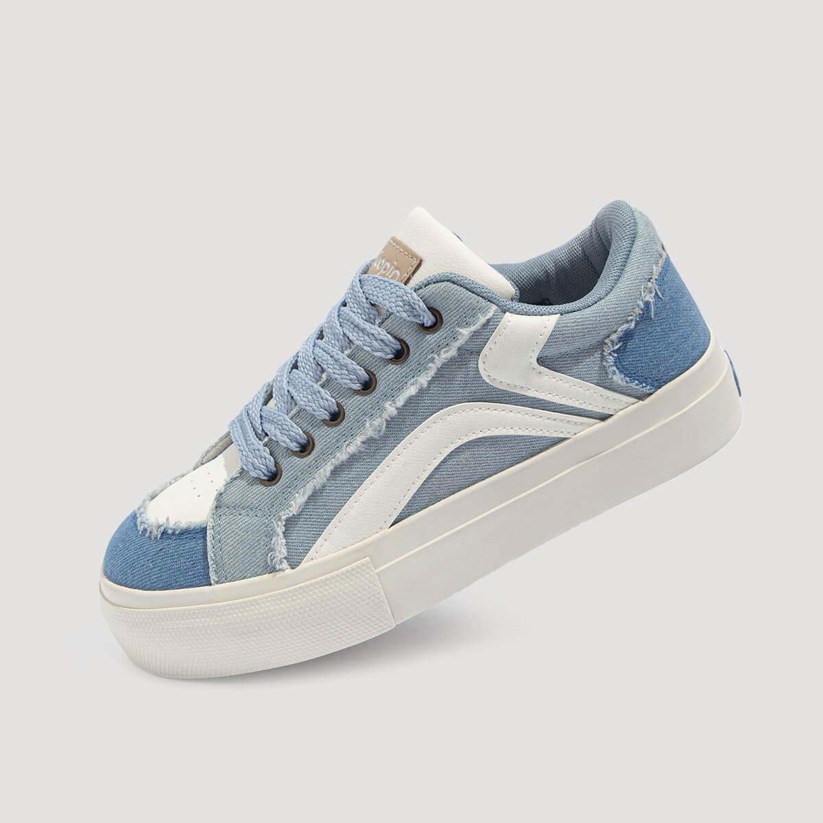 Laguna Women's Denim Platform Sneakers in Denim Blue, angled view showing platform sole