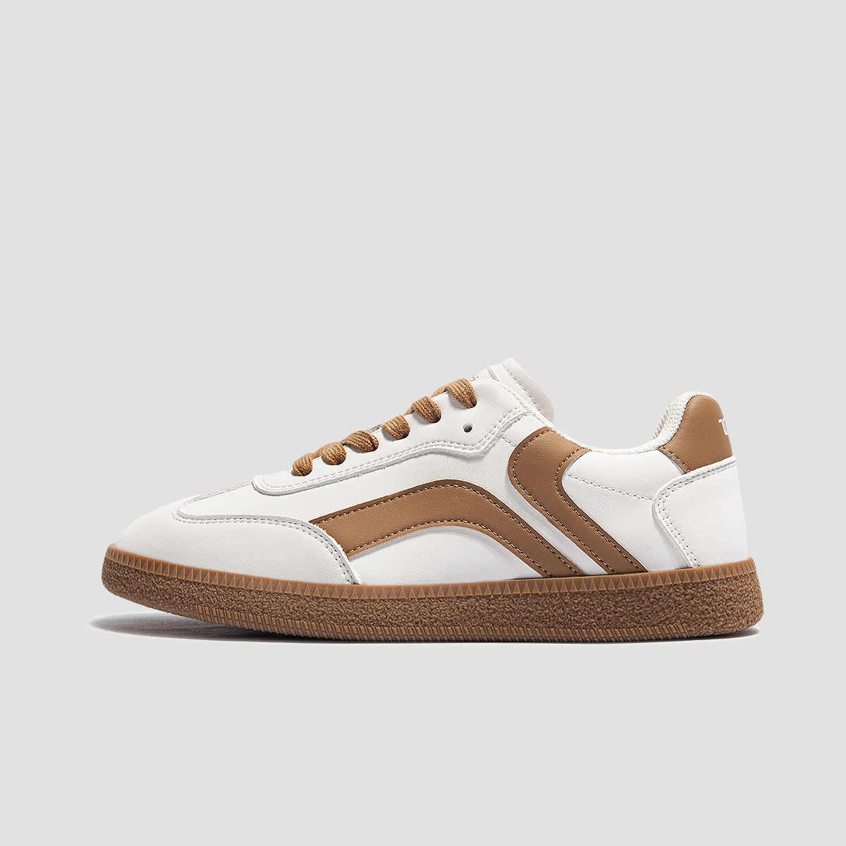 White and brown casual low-top sneaker, outer side view