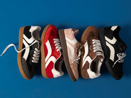 Tuopin sneakers in different colors on a blue background